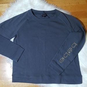 Bebe Sweatshirt w/rhinestone logo on sleeve.